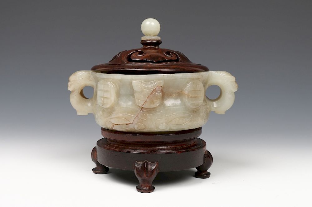 Appraisal: CHINESE CELADON JADE INCENSE BURNER TH C A double handled