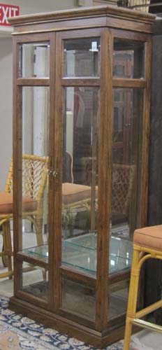 Appraisal: AN OAK AND BEVELED GLASS CURIO DISPLAY CABINET Harbor House