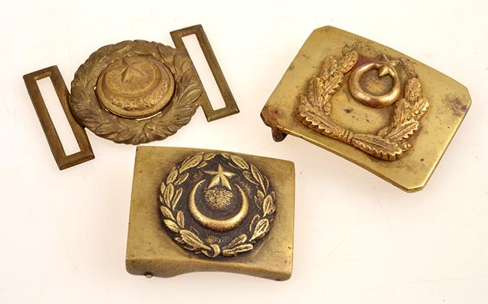 Appraisal: THREE WWI BELT BUCKLES BRASS AND WHITE METAL INCLUDING X