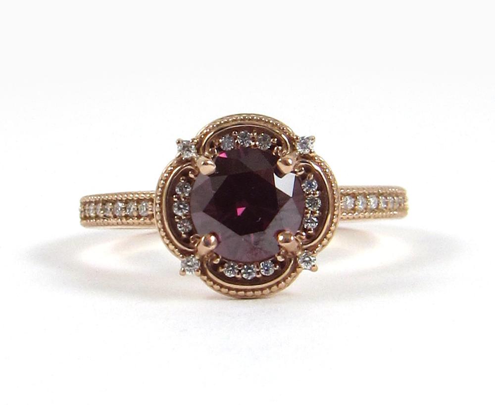 Appraisal: FANCY PURPLISH RED DIAMOND AND ROSE GOLD RING The k