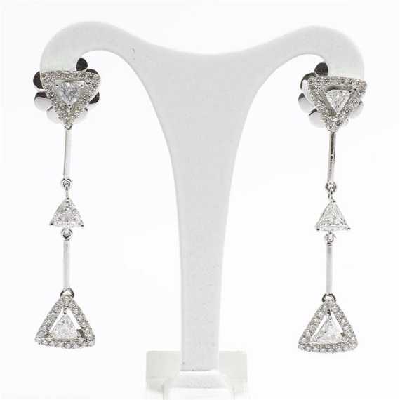 Appraisal: DIAMOND PENDANT EARRINGS White gold Decorative earclips each of triangular