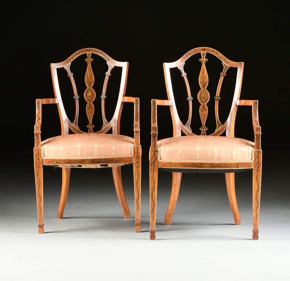 Appraisal: A PAIR OF EDWARDIAN PAINTED SATINWOOD SHIELD BACK ARMCHAIRS CIRCA