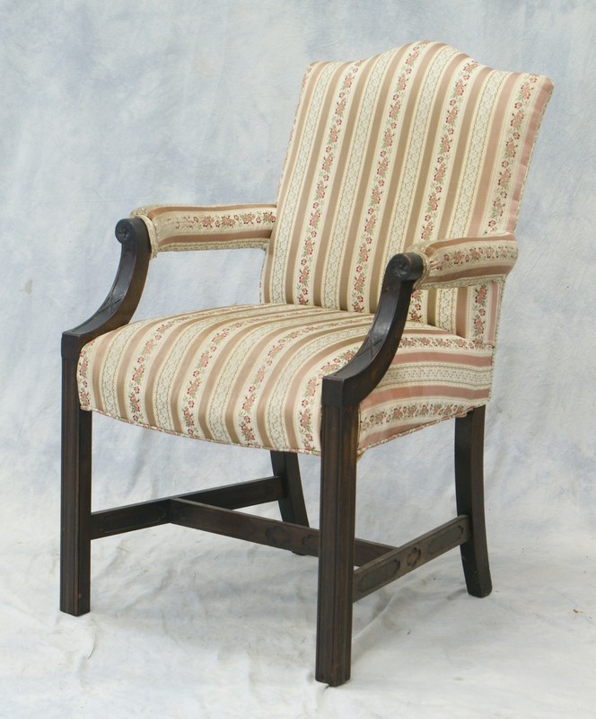 Appraisal: Carved mahogany Georgian style open armchair with striped upholstery late