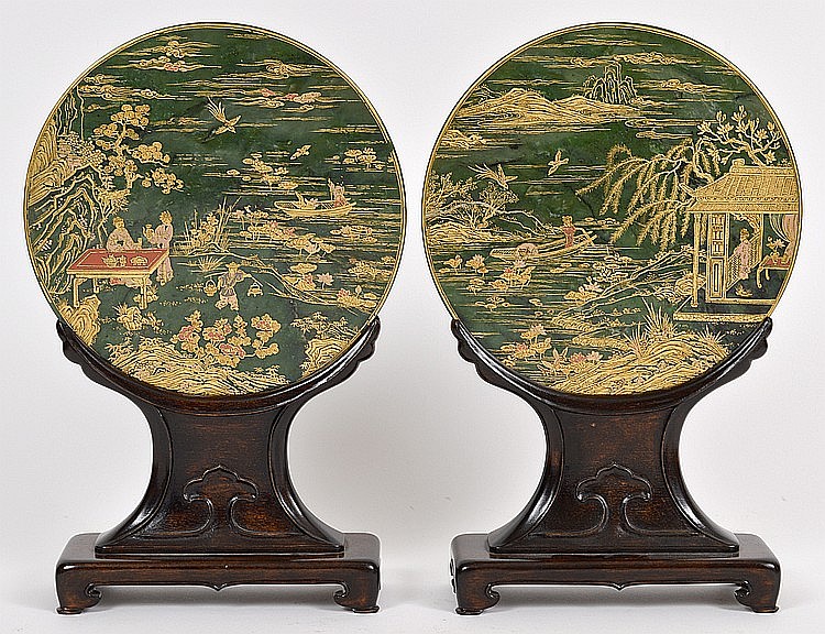 Appraisal: PAIR OF CHINESE PARCEL GILT SPINACH JADE DISCS ON STANDCirca