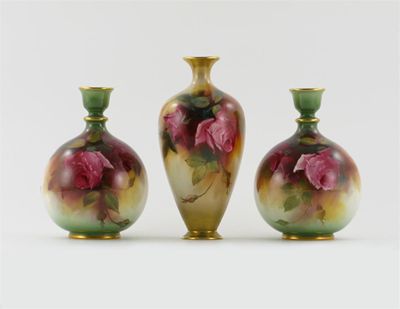 Appraisal: A pair of Royal Worcester vases painted with large pink