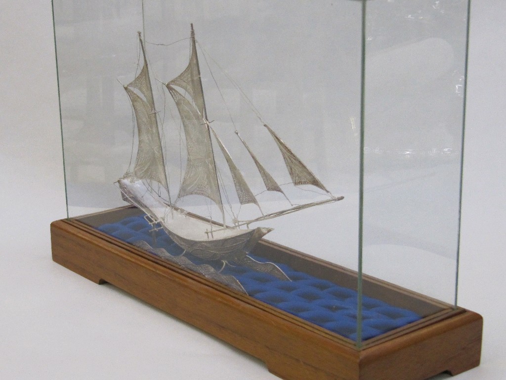 Appraisal: Silver NEF in glass case