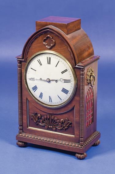 Appraisal: A REGENCY MAHOGANY CASED BRACKET CLOCK with a circular convex