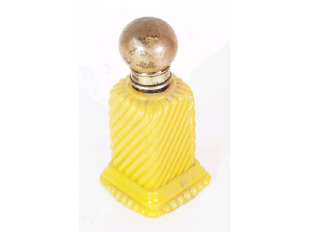 Appraisal: GEORGE V SILVER TOPPED MOULDED YELLOW GLASS SCENT BOTTLE of