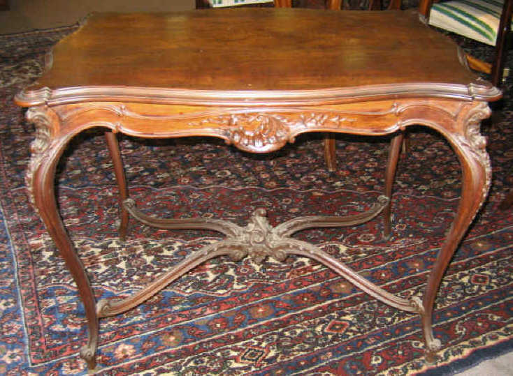 Appraisal: FRENCH LOUIS XV STYLE MAHOGANY CENTER TABLE All around serpentine