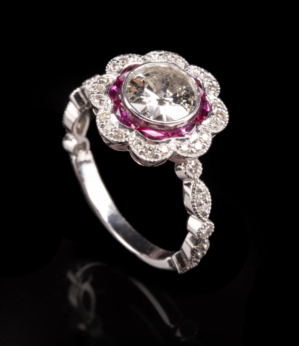 Appraisal: Platinum Diamond and Ruby Ring stylized floral design center bezel