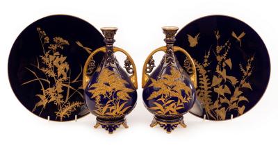 Appraisal: A pair of Royal Worcester pear-shaped vases of dark blue