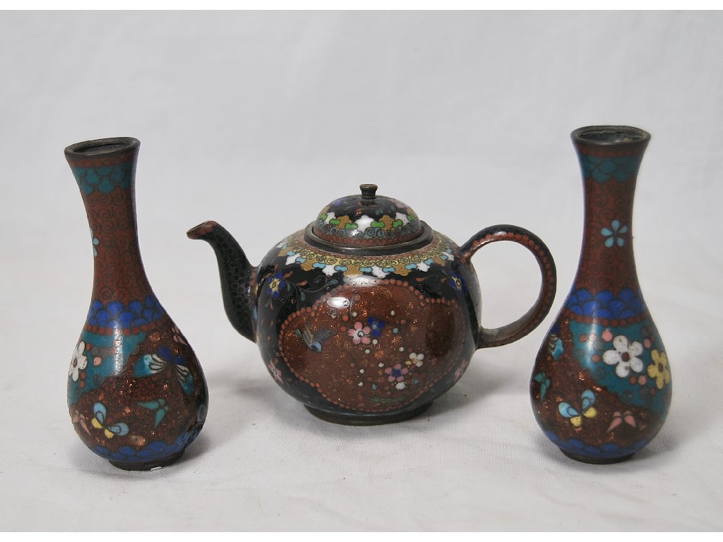 Appraisal: A Chinese cloisonne miniature teapot and two similar vases