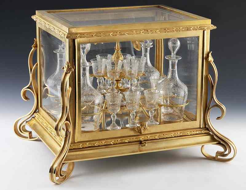 Appraisal: Baccarat style gilt bronze cave a liqueur with beveled glass