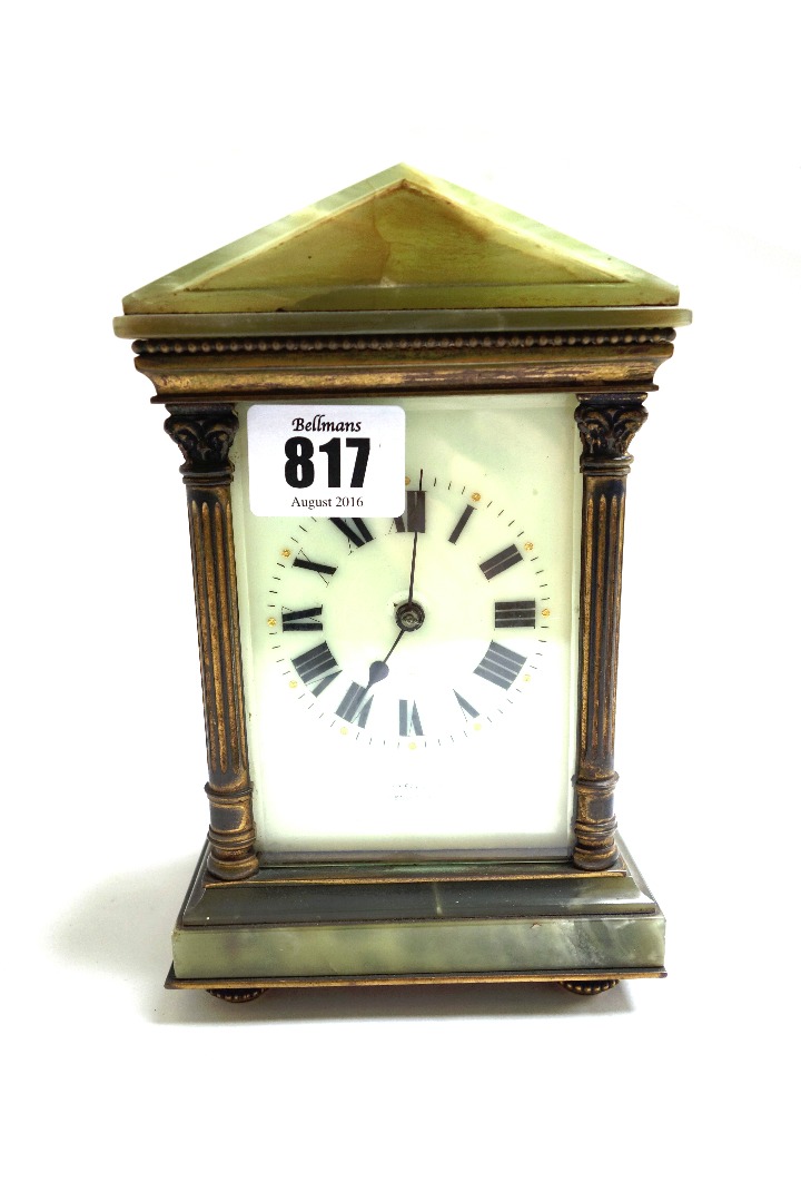 Appraisal: An onyx mounted brass cased carriage clock early th century