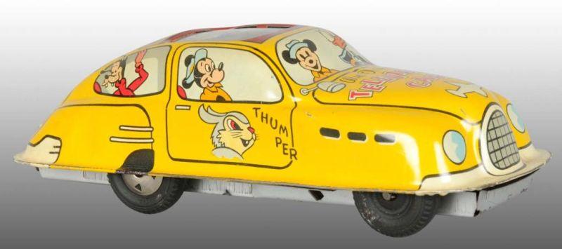 Appraisal: Walt Disney Marx Tin Friction Television Toy Car Description Includes