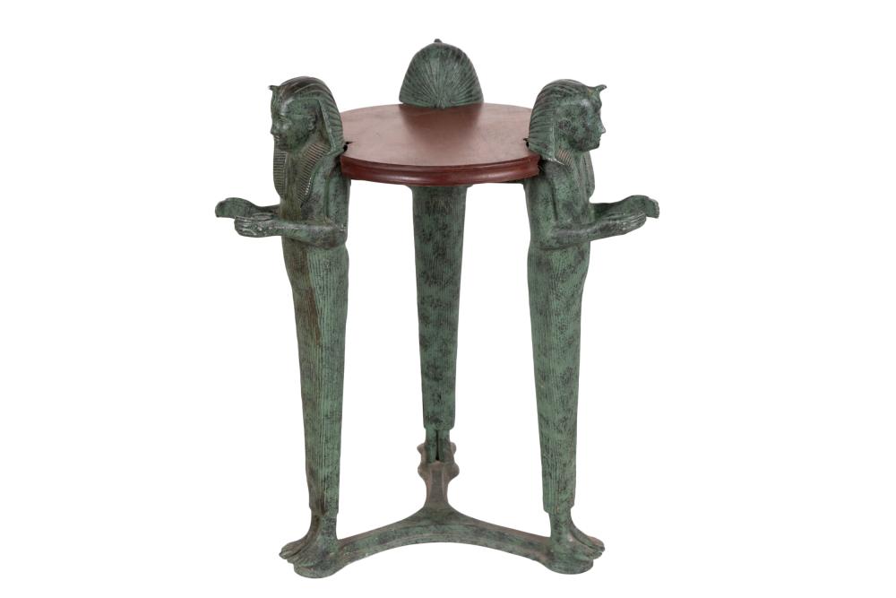 Appraisal: EGYPTIAN STYLE TRIPOD TABLEwith verdigris patinated metal figures supporting a