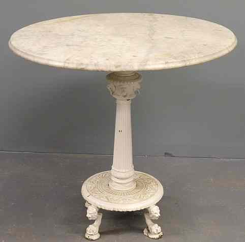 Appraisal: Victorian cast iron ice cream parlor table with a round