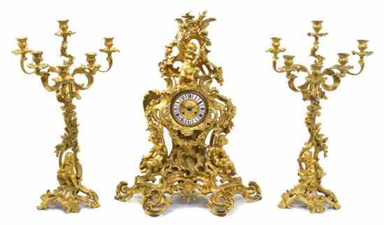 Appraisal: A Napoleon III Ormolu Three-Piece Clock Garniture Deniere th century