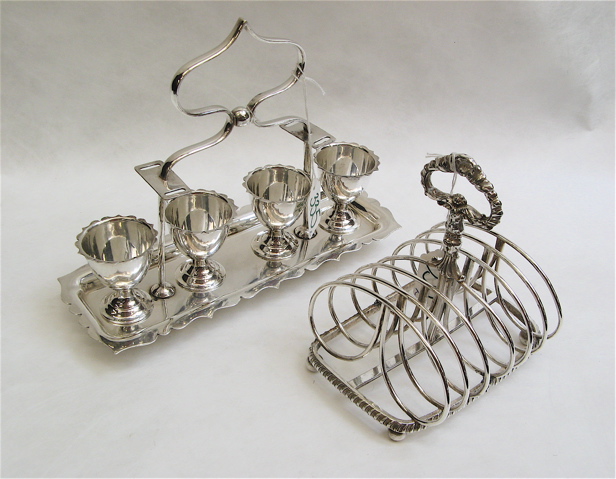 Appraisal: ENGLISH SILVER PLATED EGG CASTER TOAST RACK The egg caster