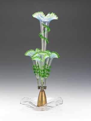 Appraisal: A Victorian Glass Epergne With a central flower form rising