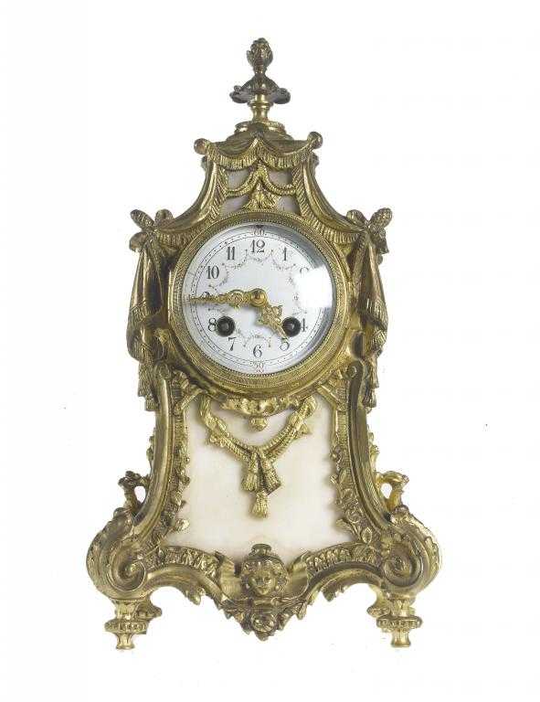 Appraisal: A FRENCH MARBLE INSET GILT BRASS MANTEL CLOCK in Louis