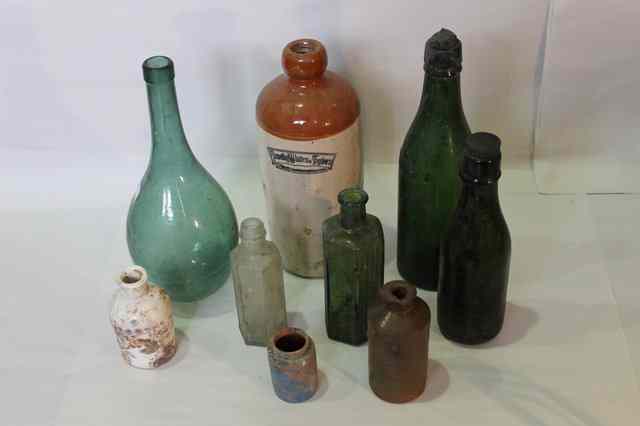 Appraisal: A COLLECTION OF VICTORIAN GLASS BOTTLES stoneware jars and other