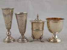 Appraisal: Silver Two kiddush cups an egg cup and a pepper