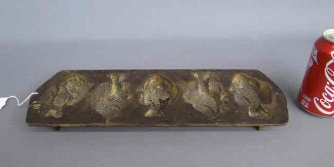 Appraisal: Early corn muffin mold with fish motif '' Length