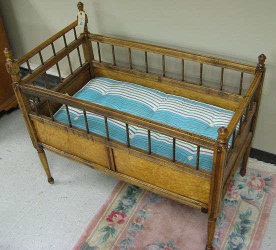 Appraisal: LATE VICTORIAN INFANT BED American c of wood construction with