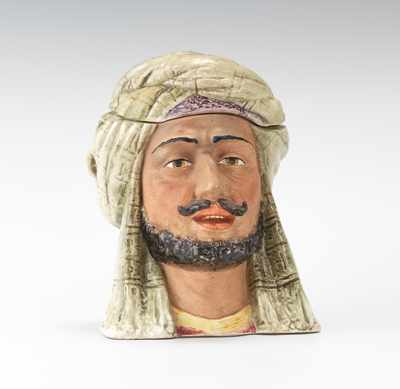 Appraisal: An Arab Figural Head Tobacco Jar Porcelain head with polychrome