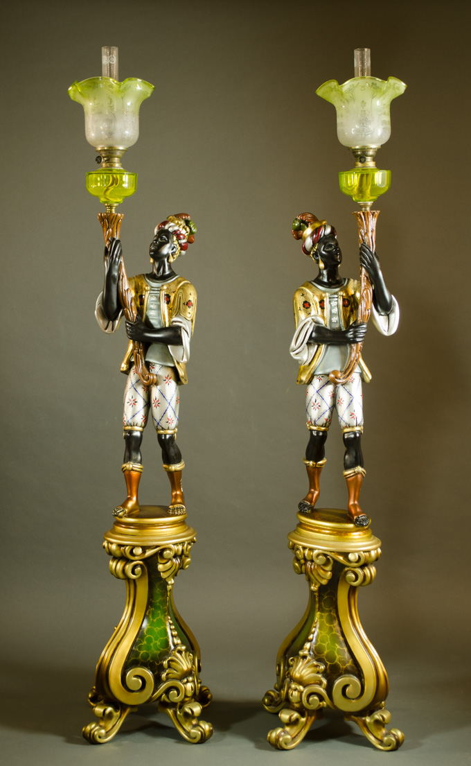 Appraisal: A PAIR OF FIGURAL BLACKAMOOR KEROSENE FLOOR LAMPS each a