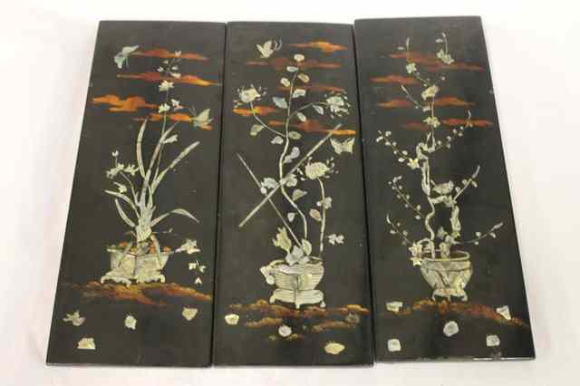 Appraisal: A SET OF THREE JAPANESE BLACK LACQUER WALL PANELS of