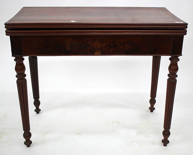 Appraisal: A VICTORIAN MAHOGANY FOLDOVER CARD TABLE with green baize top