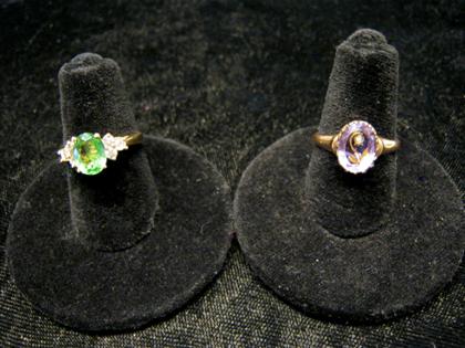 Appraisal: Two yellow gold and gem set ringsOne oval cut emerald