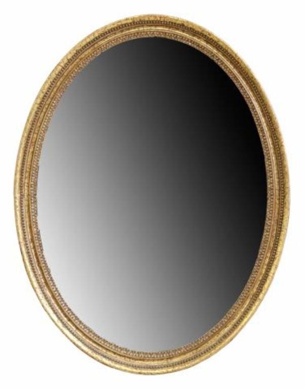 Appraisal: English giltwood wall mirror th c oval frame with beaded