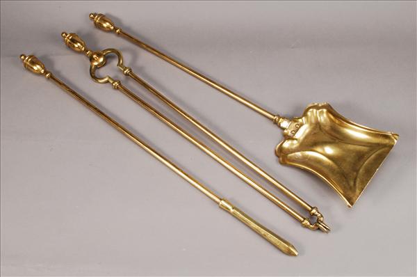 Appraisal: A set of three brass fire tools in the George