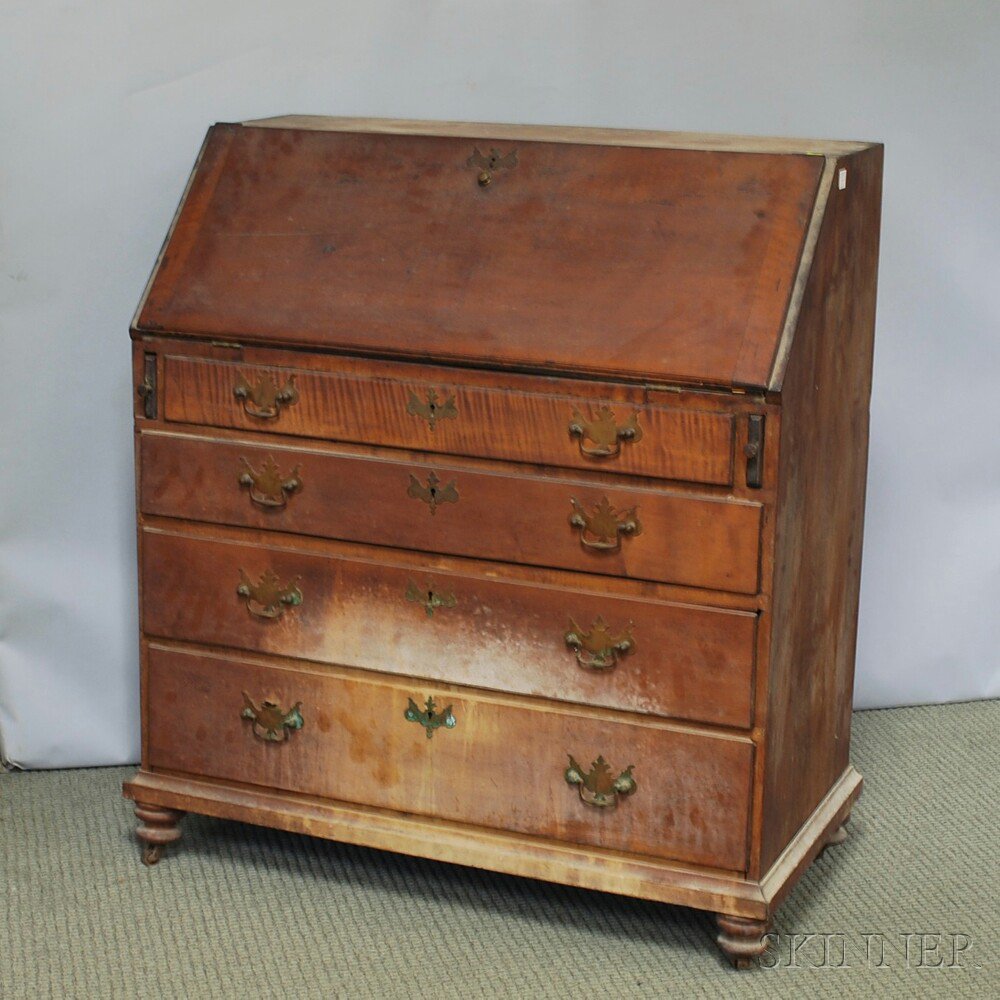 Appraisal: Tiger Maple Slant-lid Desk the lid opening to an interior