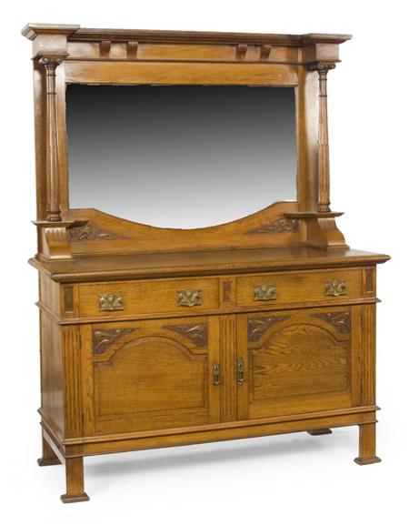 Appraisal: A Victorian oak mirror back sideboard the inverted breakfront cornice