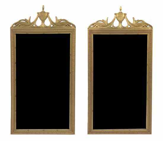 Appraisal: A Pair of Italian Giltwood Pier Mirrors each with urn