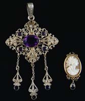 Appraisal: LOT OF TWO PIECES OF JEWELRY The filigree diamond shaped