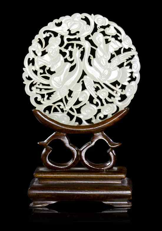 Appraisal: A Chinese White Jade Roundel of pure white color of