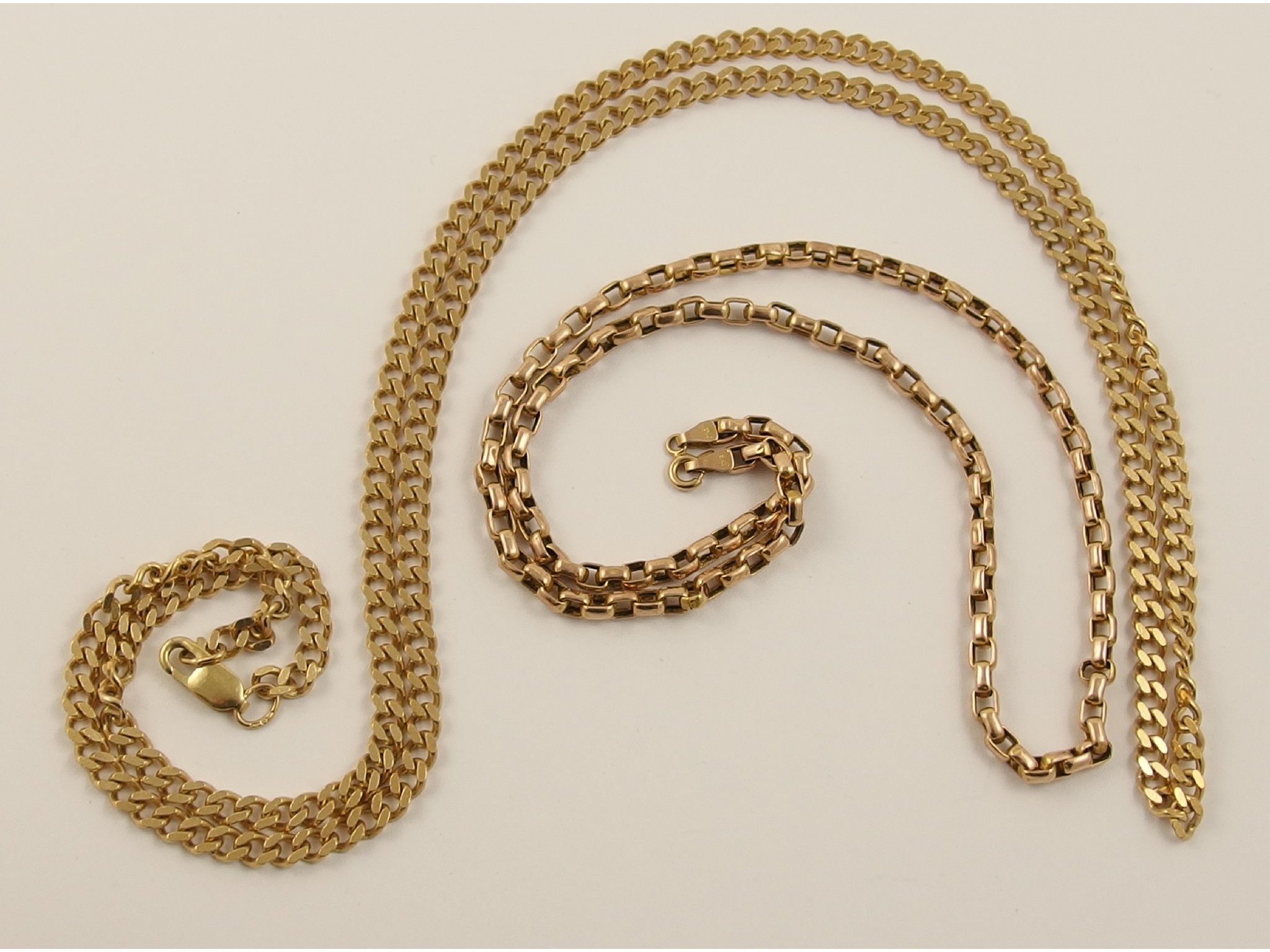 Appraisal: A ct curb chain and a ct belcher chain approx