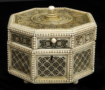 Appraisal: RUSSIAN IVORY FILAGREE-MOUNTED WOOD OCTAGONAL BOX The hinged lid with