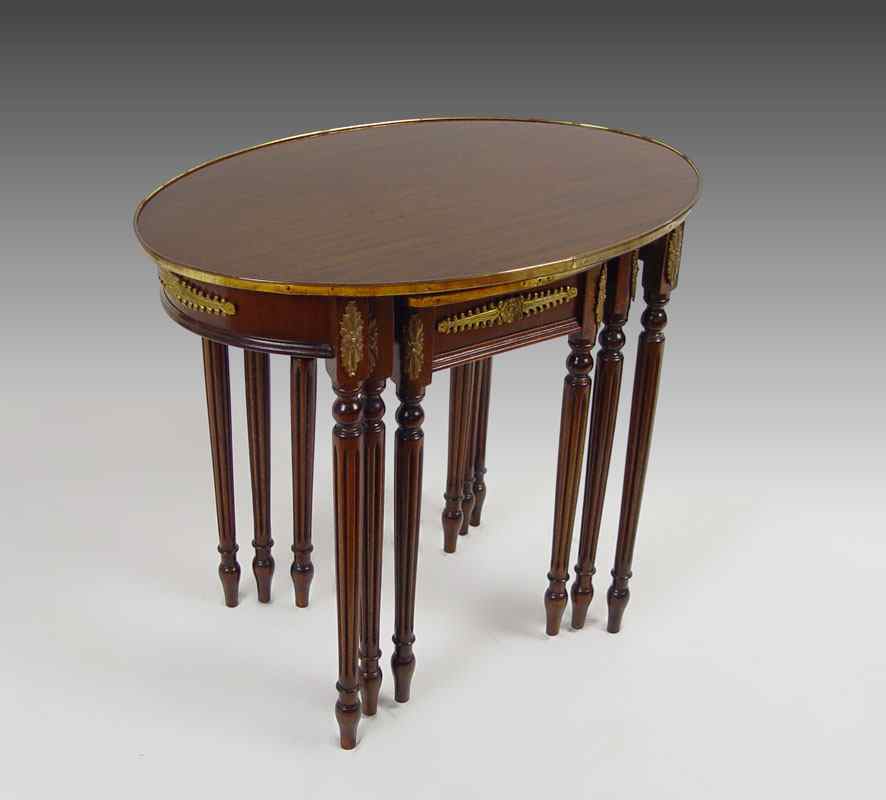 Appraisal: PIECE NEST OF SIDE TABLES Oval with brass finish trim