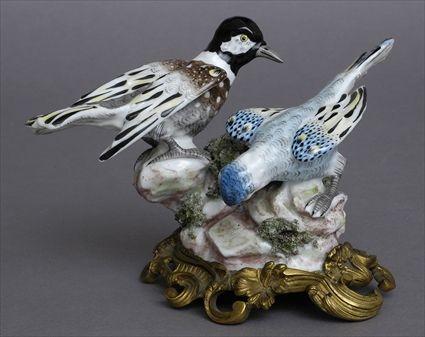 Appraisal: FRANKENTHAL PORCELAIN BIRD GROUP ON LOUIS XV-STYLE GILT-METAL BASE Modeled