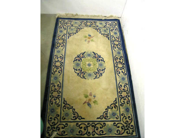 Appraisal: Chinese Handmade Wool Rug floral on ivory ' x '