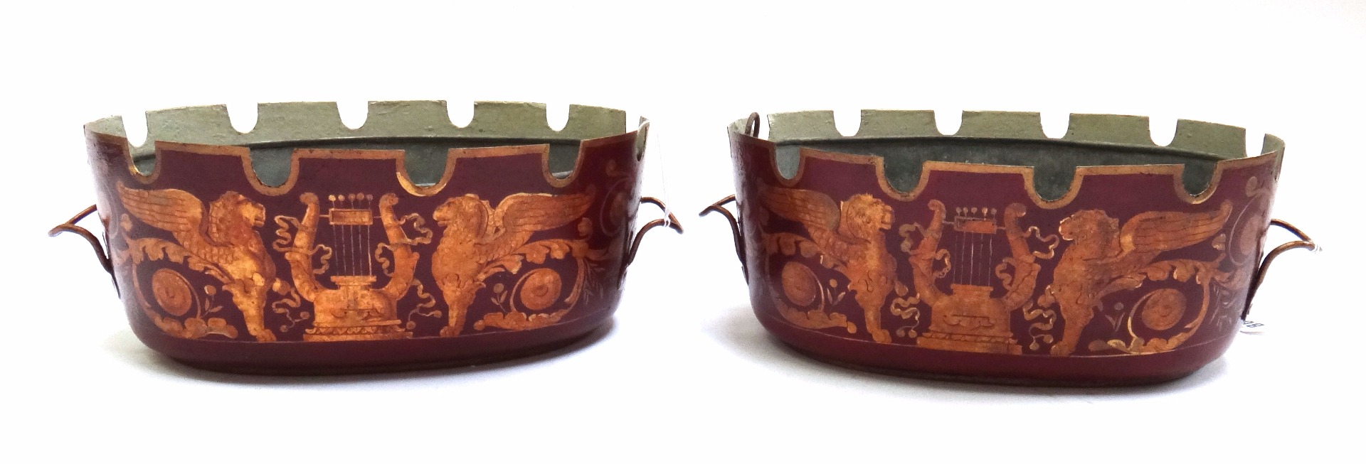 Appraisal: A pair of Empire gilt and red Japanned tole jardinieres