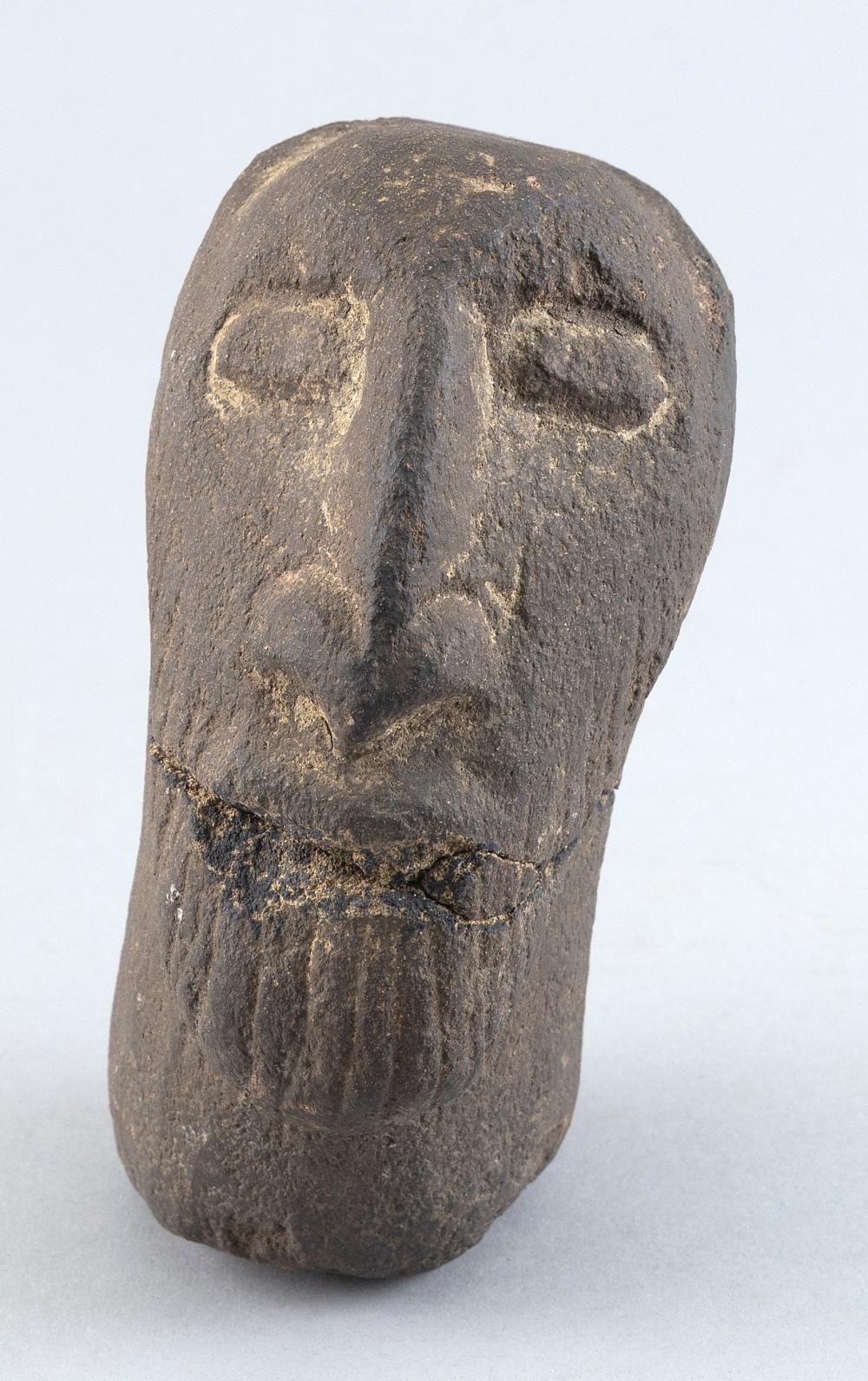 Appraisal: CARVED STONE HEAD OF A BEARDED MAN HEIGHT CARVED STONE