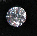 Appraisal: AN UNSET ESTATE DIAMOND round brilliant ct color grade appears