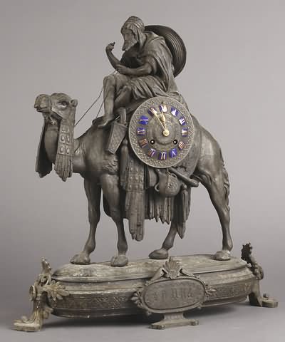 Appraisal: Circa white metal case with well articulated camel and rider